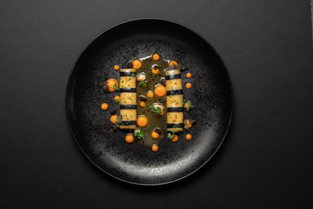 Lobster cannelloni with carrots and black olive 